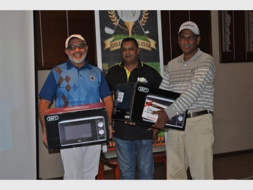 Great golf: Dr Ayoob Bux (left) and Peppy Govender are pleased to have won Pro-Vision's recent annual golf day at Port Shepstone Country Club. They scored 51 points. Congratulating them is main sponsor Pat Pather of National Auto Glass.