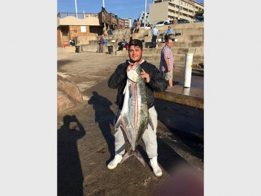 Wow! Andries Matthysen showsoff the 17,5kg garrick he caught at Margate pier using live shad.