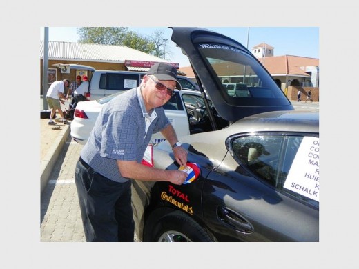 All set: Cobus Grobelaar (observer) seals the filler cap.
