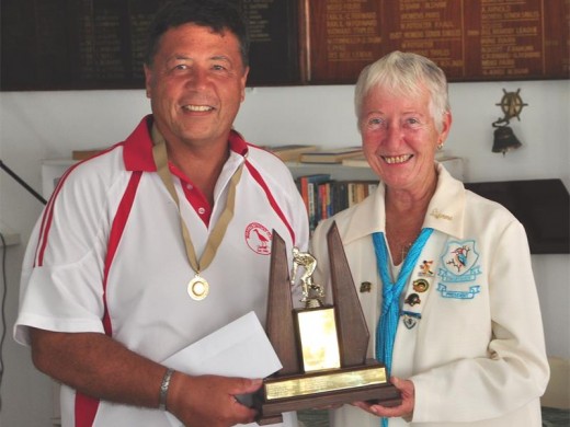 Loving the sport: Margate CC's Hans van der Walt is the new KBA men's novice singles champ. KBA president Lynne Bamber congratulates him.