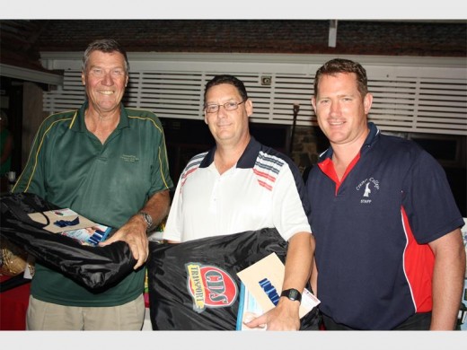 Fantastic score: Roly Shaw (left) and Ian Marx pulled out all the stops to card 55 points and win the Creston College golf day at Port Shepstone CC last Saturday. Creston College Senior Primary headmaster Ryan Kyle congratulates them.