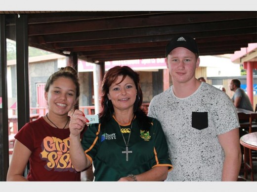 Linda de Bruin (middle) from Douglas Mitchell draws the winning ticket. She is flanked by Westley Nyman and Gabriella Schreuder Scholfield.