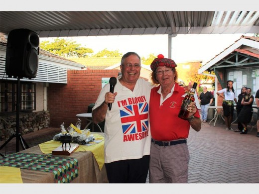 Awesome: Best dressed golfer for the day at Port Shepstone CC was Ken Morris (right) being congratulated by Bevis Fairbrother, who did the prize-giving and keeping the crowd entertained.