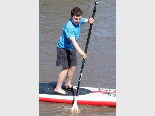 Trying hard: After showing a little fear at first, Braygan Massey of Pumula soon got into the swing of things. 2244vee