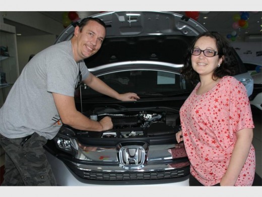 Power plant: Judd and Claudia Sherrin of Umtentweni check out the powerful engine. 2778vee