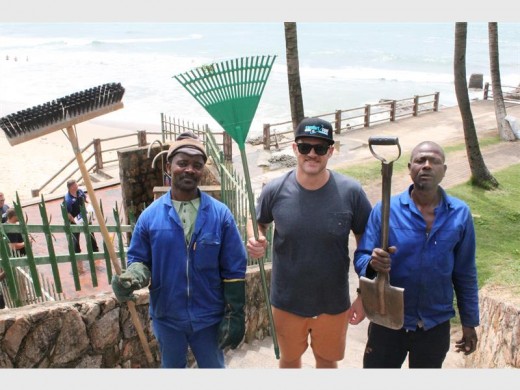 Team effort: Kevin Bartlett (middle) helps clean up, together with Hamilton Mbili (left) and Eric Ncane of Margate Engineering.