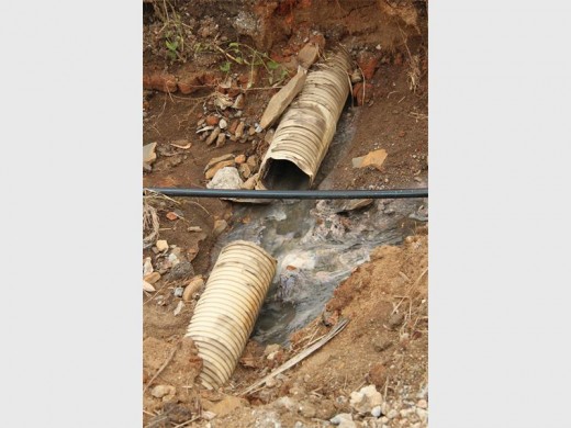 This partially open pipe in Oscar Borchers Road is dangerous. 