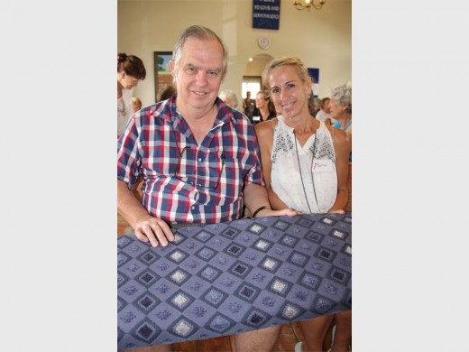 Pastor David Thorburn-Humphrey thanks Esme Derksen for the attractive cushions to go on the pews at the church. 8059SN