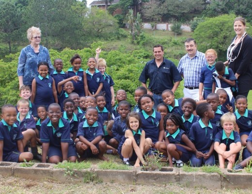 South Coast Academy staff members Jacomina Grobler (back, left) and Danae Shaw (right) with Chris Swart and Dr Mike Heaney of AfriForum.
