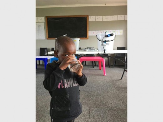 Gulp it down: A young boy slakes his thirst with wonderful clean water.