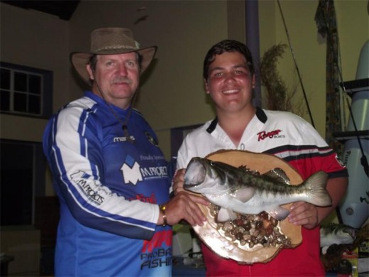 Up and coming: Joshua Fisher the winner of the under 18 category, with chairman Manus Erasmus.