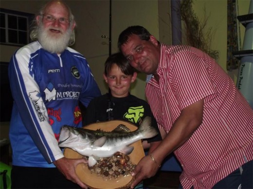 Young champ: LJ Mitchley with his father Jacques (and Legends Kayaks sponsor) and Pisces Predator sponsor Pem Reynecke (left).