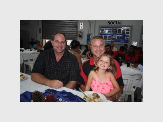 Family time: Andrew Thompson, his brother Richard, and his daughter Emma at the Status Panelbeaters year-end thank you function.