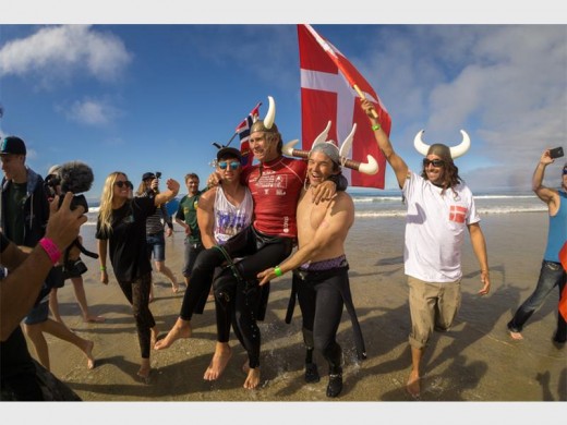 Goose-bump moment: Gold medalist Bruno Hansen, formerly from the South Coast, and the sole representative of Denmark, is carried out of the water by Team Norway in a great display of camaraderie between nations. PHOTO BY ISA/SEAN EVANS