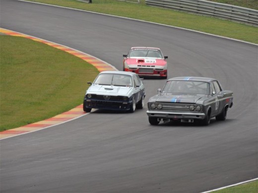 Festial of speed: the big guys elbow each other off the track.