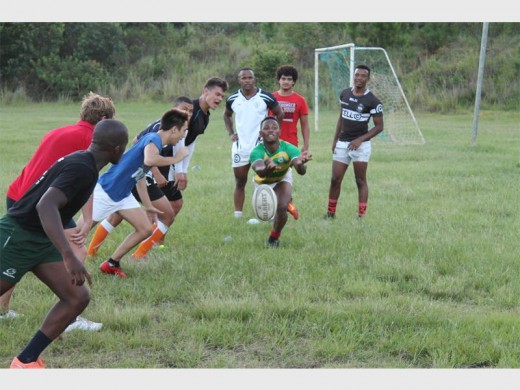 Perfect pass: The Riversmead South Coast Warriors U20s go through some skills drills at practice this week.