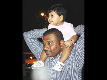 Quinton Reddy and his daughter Amara were wowed by the lit up home in Rhus Lancea