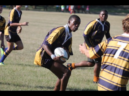 Sidestep manoeuvres - Thabiso Zungu looks to hit a gap as the cover defence moves acroos to block his progress