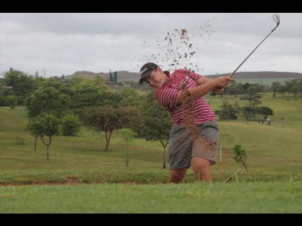 Jarred Good chips one out of the bunker on the 18th PHOTOS: Richard Springorum