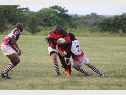 Richards Bay's O'Brian Oqayi carries ball into contact