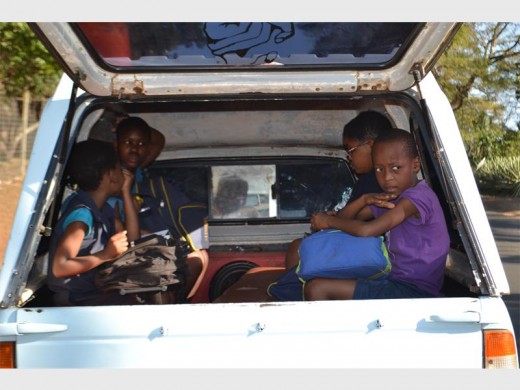 Primary school children wait in the bakkie which will transport them home after a long day at school PHOTOS: STEVEN MAKHANYA
