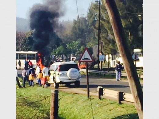 Smoke rises from tyres set alight on route to RBM this morning