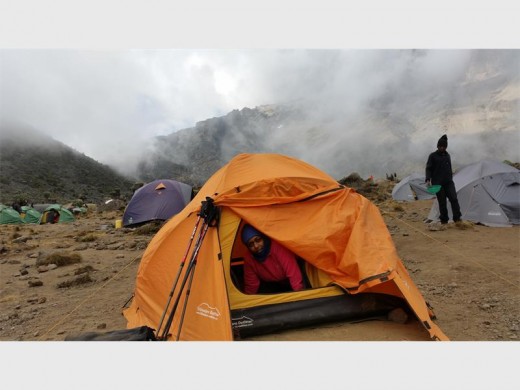 A cozy tent awaited the couple after a long day in the cold weather