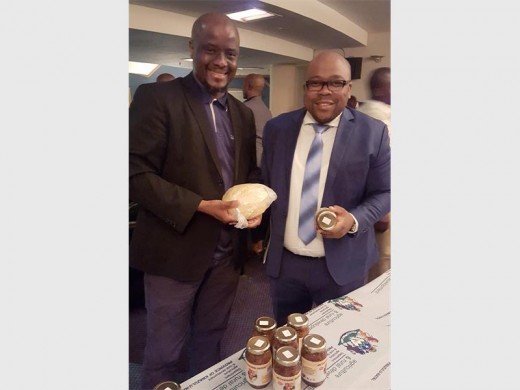RBIDZ CEO Pumi Motsoahae and City Mayor Mduduzi Mhlongo enjoy perusing some of the locally produced goods at the seminar's stands