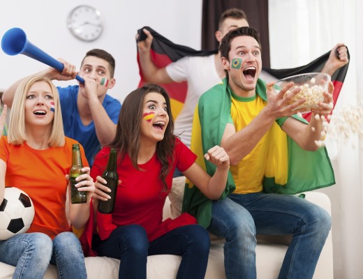 Crazy soccer fans during the football match