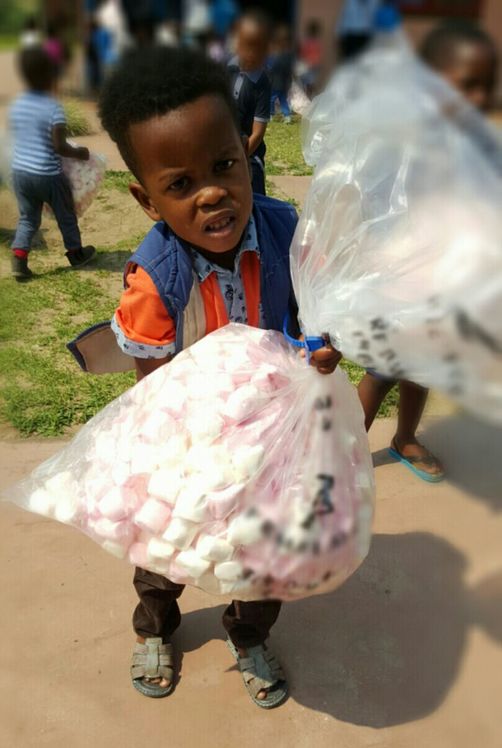 Not sure what the tooth fairy will have to say about this. This young man carried a heavy load of blessings away after Judea Harvest's marshmallow delivery at Moedi Community Care and Early Childhood Development Centre