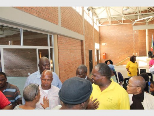 MMC for Housing, Dan Bovu, is questioned by the Rabie Ridge community about Mayor Parks Tau's whereabouts.