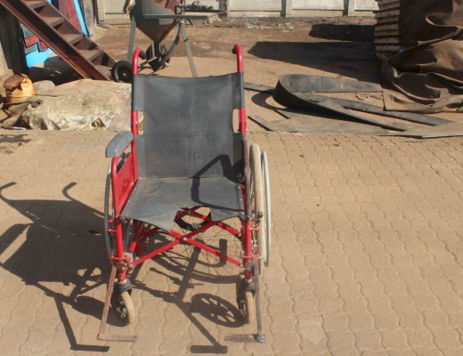 James Nkabi's wheelchair is in desperate need of repair.