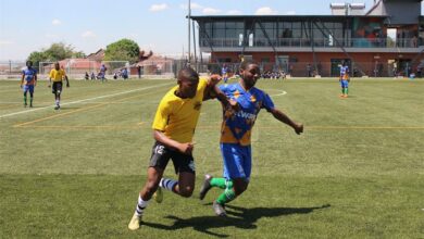 Alex Black Poison fighting for the ball