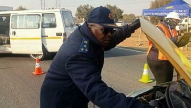 Ekurhuleni deputy district commissioner, Brigadier Lebohang Machakela inspect a car during the operation.