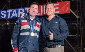 Nick Berry, a Netcare 911 rescue officer who won his age category in the individual physical fitness challenge, with Wimpie van Onselen, emergency and rescue services business field manager for Dräger.