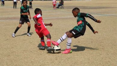 Alidzulwi-Musa Netshitomboni marks a player from Transition Academy.