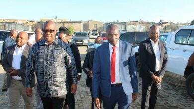 Gauteng Premier Panyaza Lesufi walks alongside Mayibuye Primary School principal Kgabo Rammutla. Photo: Sphiwe Masilela