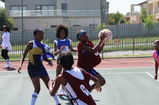 Clayville Netball Club player Nompumelelo Kgwedi (on the ball) is marked by Midrand Royal players. Photo: Sphiwe Masilela