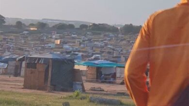 Thousands of illegal structures built on open land which is allegedly owned by the City.