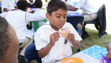 Matteo Ebrahim eats his cupcake.