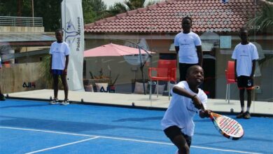 Snenhlanhla Happy Magada, a Grade 6 learner at Dr Mathole Motshekga Primary School, returns the ball.