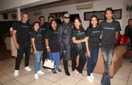 Karou ‘KC’ Charou (with shades) flanked by his fans before the start of the show. Photo: Sphiwe Masilela