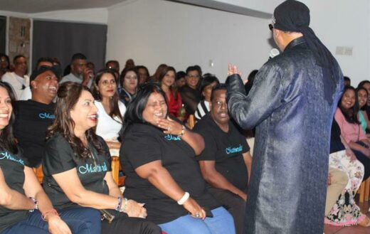 The audience laughs at KC jokes. Photo: Sphiwe Masilela