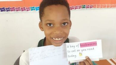 Nathan Matikiti in Grade 2 shows off the story he has completed.