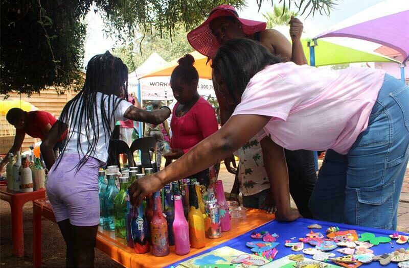 Parents and children peruse the stalls.