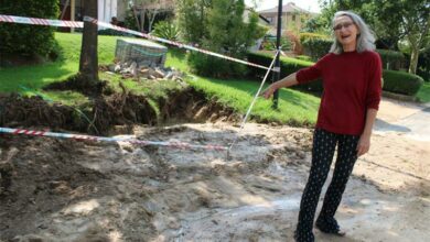 Summerset Estate resident Bridget Theunissen points to where the water leak was. Photo: Sphiwe Masilela
