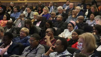 Attendees listen attentively to the speakers at the ECD workshop.