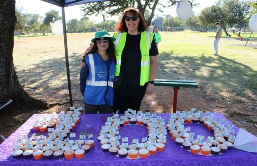 Amina Saber and Patricia Nementzik pose in front of cup cakes. Photo: Sphiwe Masilela