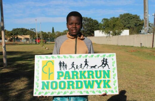 Thuso Lithole (14) is the first teenager to reach the finish line. Photo: Sphiwe Masilela