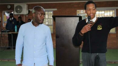 Mpumelelo Buthelezi, the speaker of the day, and Michael Ndou. a learner at Noordwyk Secondary School.